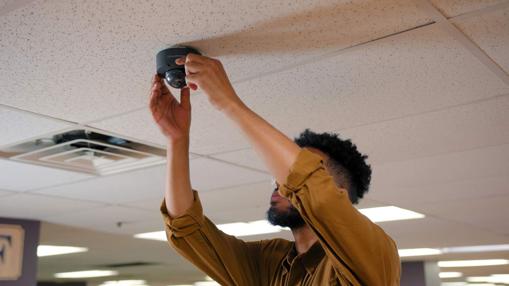 Man Installing Camera
